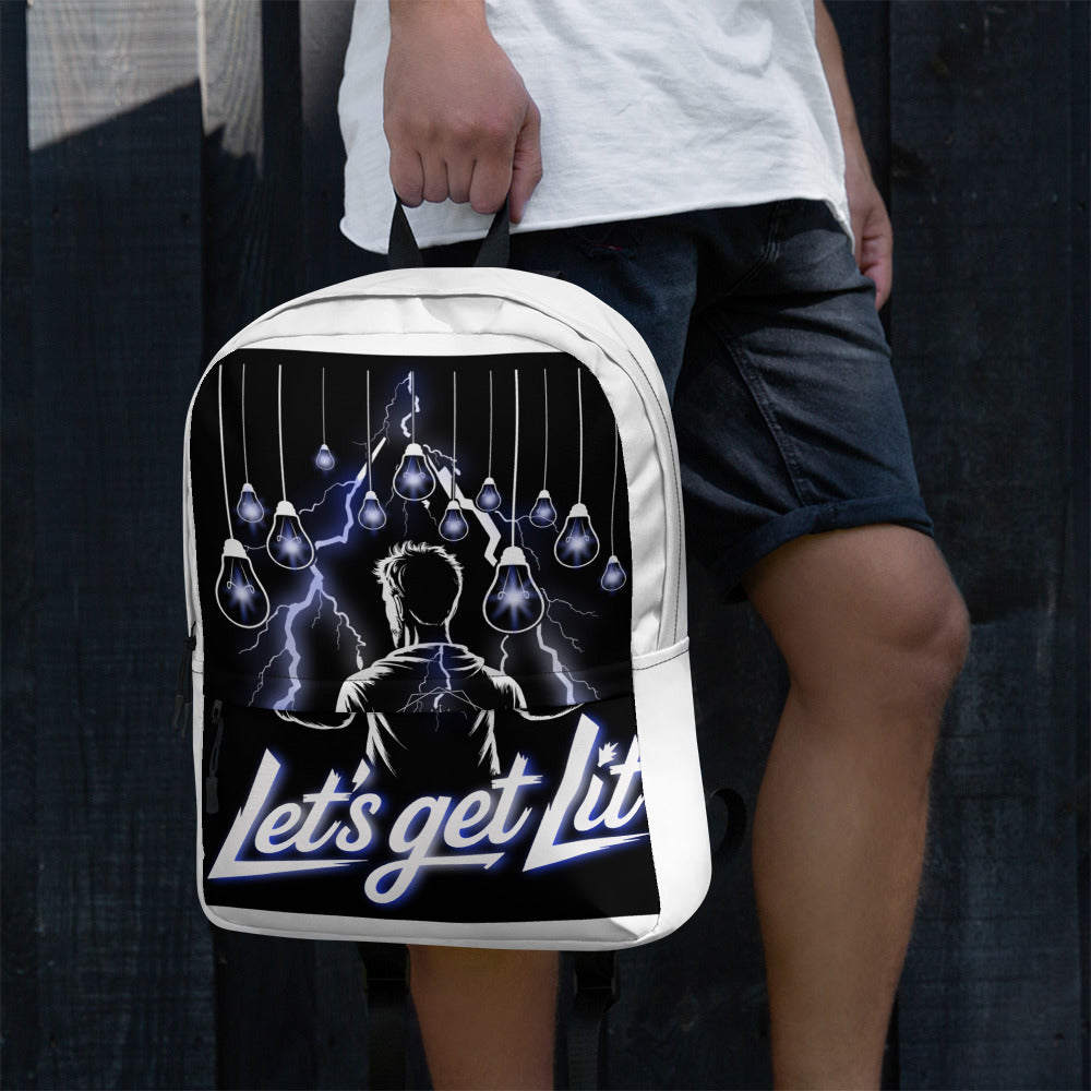 Person holding a white backpack with a graphic design and text 'Let's get lit'.